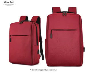 Detail of wine red business laptop backpack showing the external USB charging port