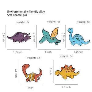 Size chart for cute cartoon dinosaur enamel pins showing dimensions and weights in pastel colors