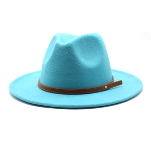 Detail of lake blue wool fedora hat with brown leather band and silver rivet accents
