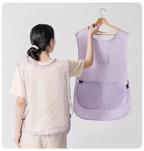 Detail of taro purple breathable mesh apron with large pocket and sun embroidery