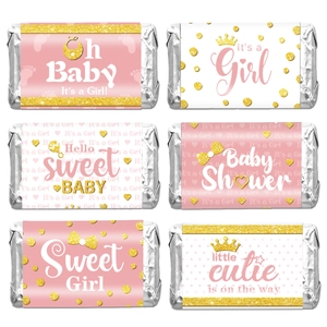 Pink and gold Baby Shower candy bar wrappers featuring 'It's a Girl' and crown designs