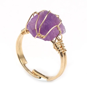 Handmade wire wrapped ring with raw purple amethyst crystal on gold adjustable band