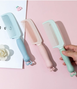 Macro view showing the detailed texture and colors of pastel cartoon hair combs for girls