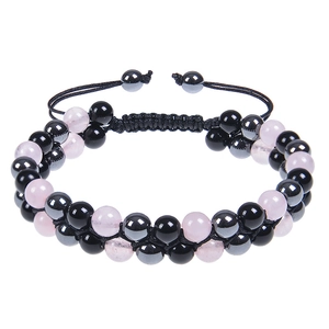Detail of double-layer natural amethyst and hematite beaded bracelet with adjustable cord