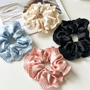 Elegant pleated satin scrunchies in cream, blue, pink, and black for women