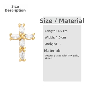 Detail of 1.5cm 18K gold plated cross earrings with marquise-cut clear zircon stones