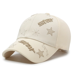 Beige baseball cap with gold star embroidery and star text on textured woven fabric