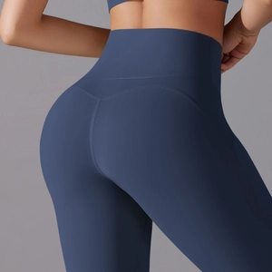 Detailed close-up of high-waisted seamless yoga pants featuring an ergonomic butt-lift design
