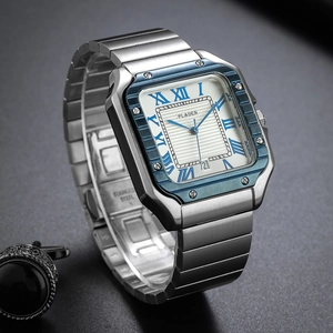 Macro view of square watch dial with roman numerals, date window and textured white face