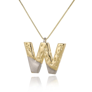 Detail of two-tone gold and silver letter W pendant with hammered texture and chain