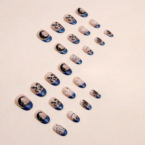 French blue glitter oval press-on nails with snake and moon mystic patterns