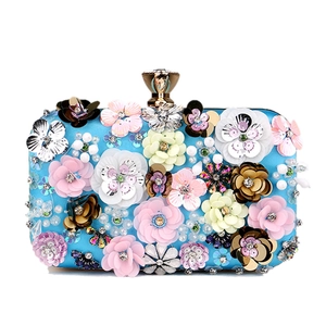 Exquisite handmade floral beaded clutch bag with blue satin and 3D petal sequins