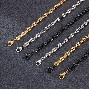 Detailed view of coffee bean link chains in gold, silver, and black with lobster clasps