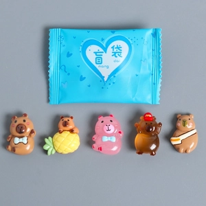 Detailed resin Capybara figurines with assorted lucky blind bag packaging for DIY crafts