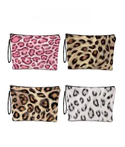 Pattern display of leopard print makeup bags in four colors with black wristlet straps