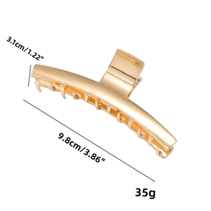 Minimalist gold metal hair claw clip with size measurements 9.8cm length and 35g weight
