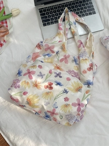 Floral mesh shoulder bag with colorful watercolor flower patterns and wide strap