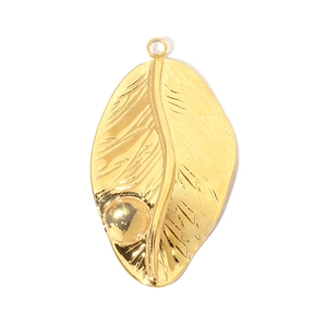 Detailed view of a textured golden leaf pendant with realistic vein patterns and beads