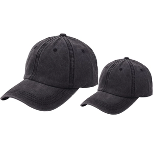 Matching set of two vintage washed black cotton baseball caps for parent and child