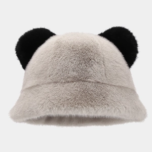 Detail of plush bucket hat featuring fuzzy panda ears and soft faux fur texture