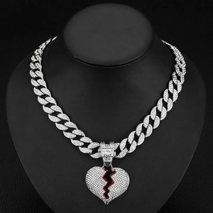 Collana cubana argento con pendente cuore infranto rosso e diamanti scintillanti