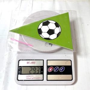 Weight measurement of 29.3g for a green football theme party banner in a poly bag