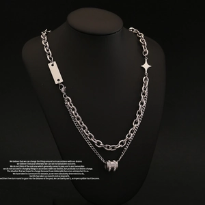 Double-layer silver star pendant necklace shown on a black mannequin for a luxury look
