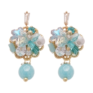 Elegant gold butterfly earrings with blue crystals and pearls for a vintage luxury look