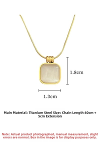 Detailed view of square opal pendant on a gold titanium steel snake chain necklace