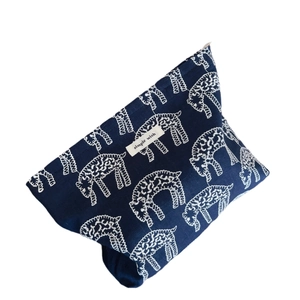 Retro dark blue canvas makeup bag with white sheep embroidery and brand label