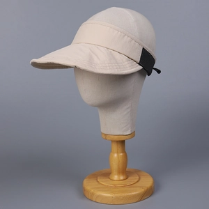 Foldable beige sport sun visor with black mesh and adjustable toggle for outdoor running