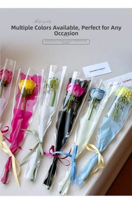 Close-up of single flower bouquets in colorful OPP wrapping with LOVE YOU ribbon