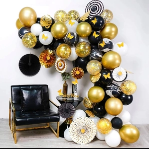 Detailed luxury party balloon arch set with gold sequins and elegant black paper fans
