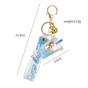 Creative liquid glitter unicorn keychain with blue milk tea cup design and strap