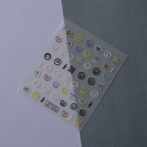 Self-adhesive 5D embossed nail art stickers with colorful smiley faces and lucky phrases
