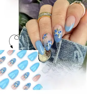 Short almond press-on nails featuring light blue finish and blueberry floral patterns