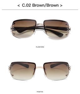 Close-up of frameless square sunglasses with brown gradient lenses and crystal accents