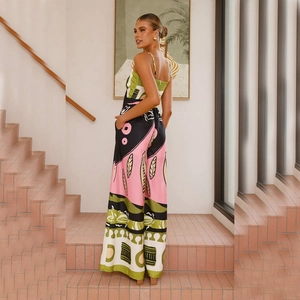 Detail view of tropical leaf print and drawstring neckline on fashion jumpsuit