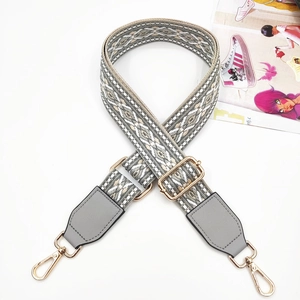 Adjustable 3.8cm wide jacquard bag strap with grey patterns and gold metal buckles