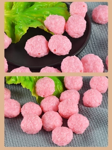 Macro detail of realistic pink PVC shrimp balls with textured surface for DIY food models
