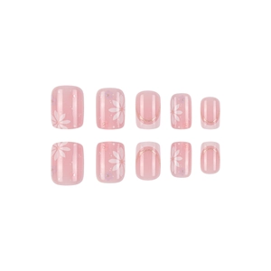 French style press-on nails in jelly pink with floral patterns and gold glitter accents