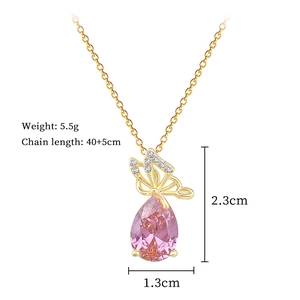 Detailed measurement view of pink butterfly crystal pendant with dimensions and weight