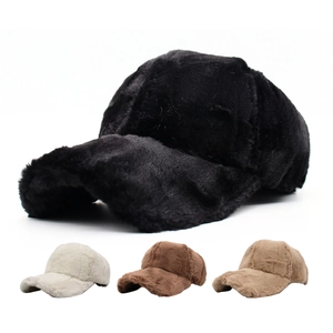 Detail showing four colors of plush winter baseball caps in faux rabbit fur texture