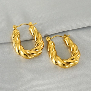 Boucles d'oreilles torsadées en forme de U plaquées or 18 carats pour femme sur soie