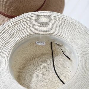French style flat top straw hat interior detail with adjustable sweatband and fine weaving