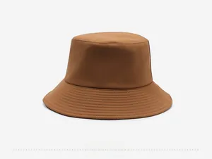 Detailed back view of a dark brown cotton bucket hat with parallel stitching on the wide brim