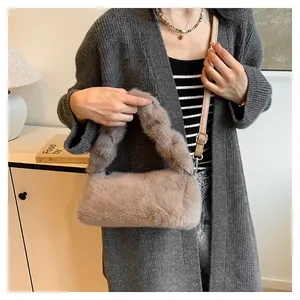 Chic plush shoulder bag in khaki with a unique knotted handle and adjustable strap