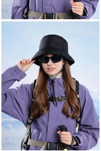 Detail of purple windproof jacket with CAMEL logo buckle and professional hiking gear