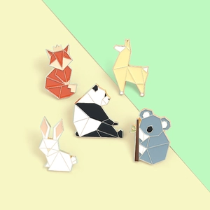 Set of five geometric origami animal enamel pins featuring fox, panda, and rabbit