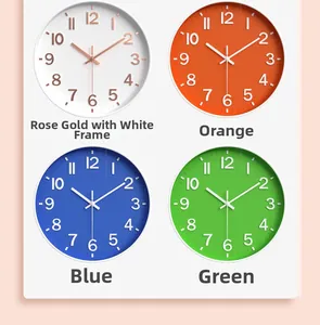 Detail view of 12-inch modern wall clocks in rose gold, orange, blue, and green colors